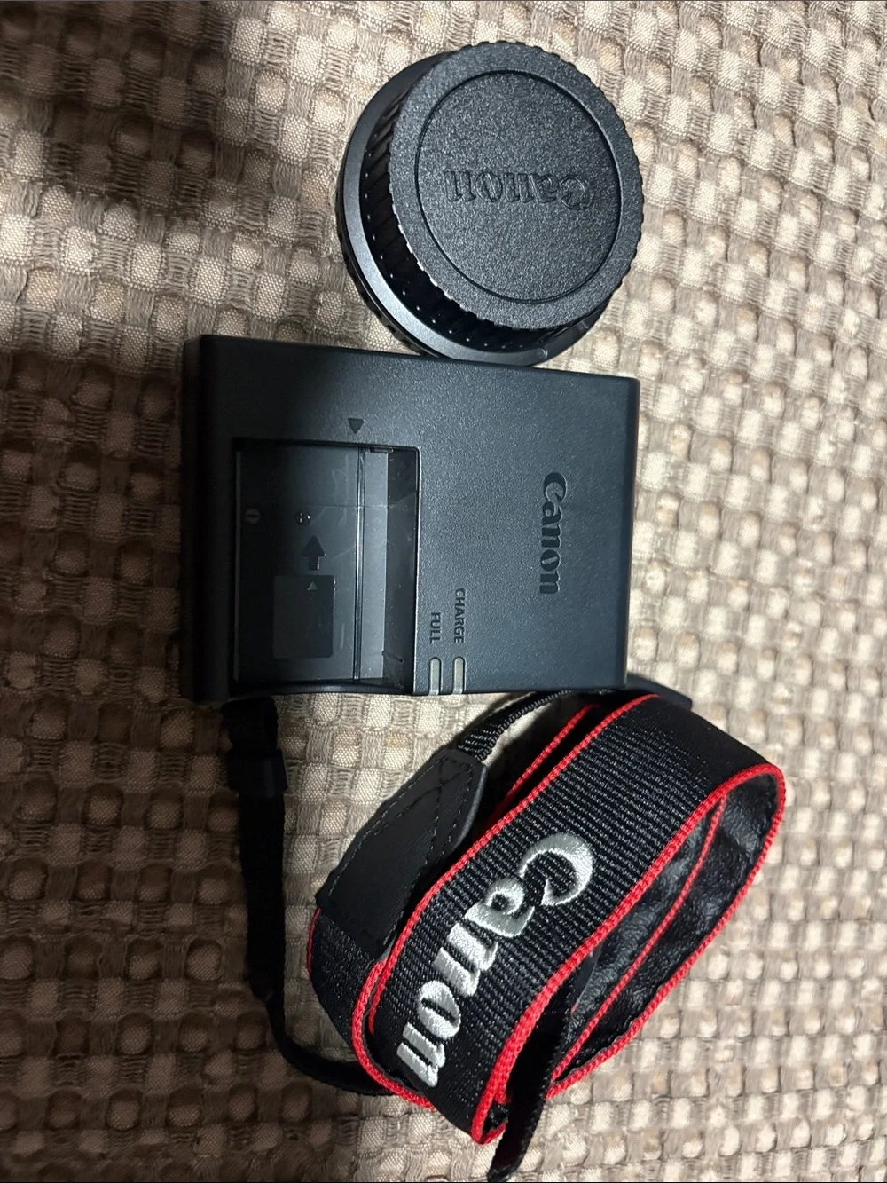 Canon Black Battery Charger with Black and Red Canon Neck Strap
